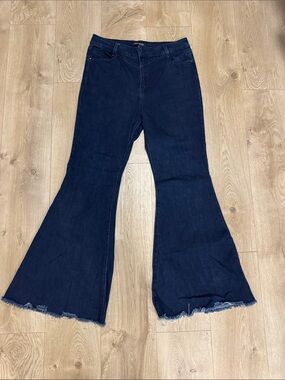 High-Rise Dark Indigo Flare Jeans with Raw Hem